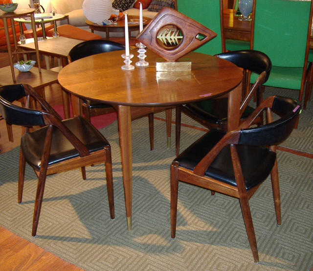 Italian walnut table by Gio Ponti for Singer and Sons 40" dia 
$5000

Set of 4 rosewood chairs by Kai Christiansen - CHAIRS ARE SOLD

SKU# F0034