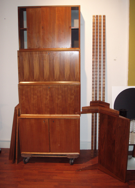 Mid-century modern, vintage danish teak, CADO wall system designed by Poul Cadovius; 4+ bays, 4 cabinets, 5 shelves with "L bracket dowel system and 2 working CADO light bars and can be arranged innumerable ways!
$2750.00
FREE SHIPPING within the Continental USA-if purchased by 6/24/07
